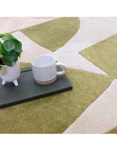 Elevate your space with the Romy 04 Kite Sage, a modern designer rug featuring abstract geometric style in soothing sage and cr