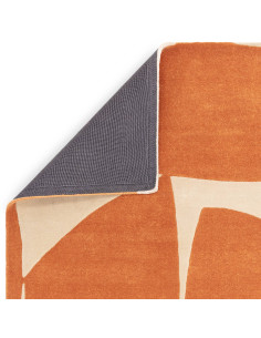 Elevate your space with the Romy 05 Kite Orange, a modern designer rug featuring bold geometric patterns and durable, easy-care 2