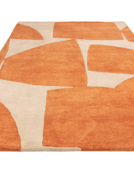Elevate your space with the Romy 05 Kite Orange, a modern designer rug featuring bold geometric patterns and durable, easy-care
