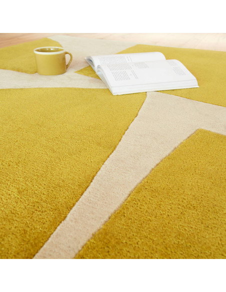 Discover the Romy 06 Kite Chartreuse, a modern designer rug with bold geometric flair, durable PET fibers, and plush comfort fo