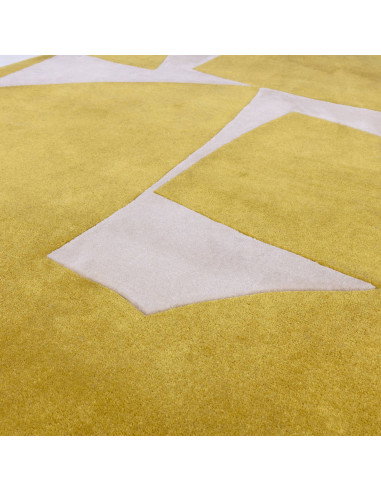 Discover the Romy 06 Kite Chartreuse, a modern designer rug with bold geometric flair, durable PET fibers, and plush comfort fo