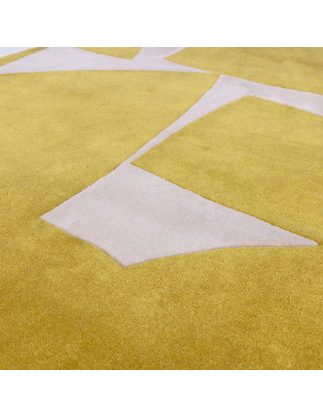 Discover the Romy 06 Kite Chartreuse, a modern designer rug with bold geometric flair, durable PET fibers, and plush comfort fo
