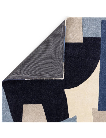 Elevate your space with the Romy 11 Element Blue, a modern designer rug featuring a bold geometric pattern and durable, easy-ca