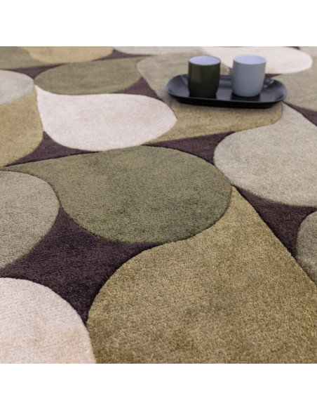 Elevate your space with the Romy 15 Jive Green, a modern designer rug featuring a plush geometric design in soothing green tone