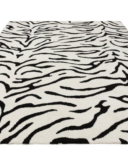 Elevate your space with the Wilder Tiger Mono rug, a bold modern designer rug featuring a striking black and white animal patte
