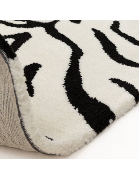 Tappeto Wilder Tiger Mono: design moderno e fantasia zebrata per un soggiorno contemporaneo elegante e versatile. Qualità e sti