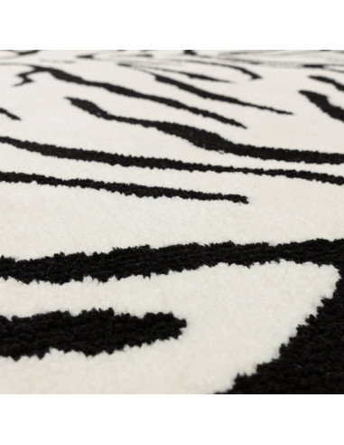 Tappeto Wilder Tiger Mono: design moderno e fantasia zebrata per un soggiorno contemporaneo elegante e versatile. Qualità e sti