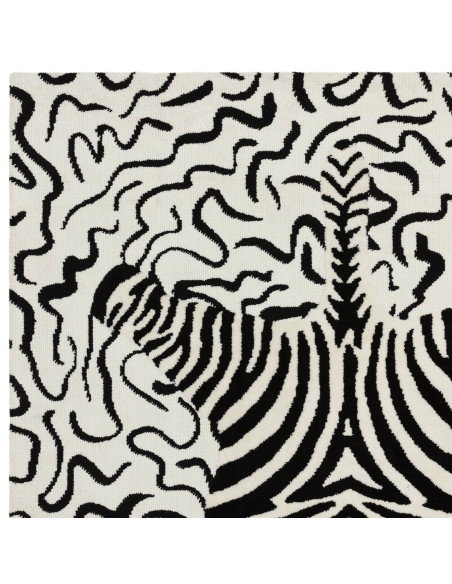 Bold black and white Wilder Zebra Mono rug blends fantasy and modern style, offering durable, plush comfort for any room’s déco