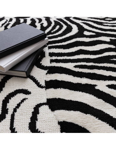Bold black and white Wilder Zebra Mono rug blends fantasy and modern style, offering durable, plush comfort for any room’s déco