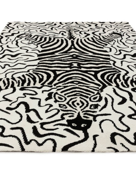 Tappeto Wilder Zebra Mono: design moderno e motivo zebrato per un soggiorno contemporaneo, resistente e facile da pulire. Elega