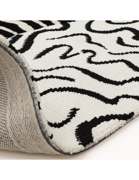 Tappeto Wilder Zebra Mono: design moderno e motivo zebrato per un soggiorno contemporaneo, resistente e facile da pulire. Elega