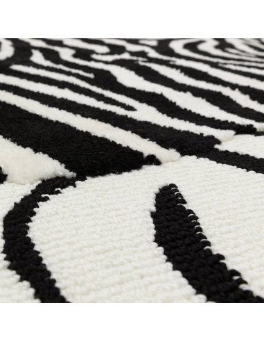 Tappeto Wilder Zebra Mono: design moderno e motivo zebrato per un soggiorno contemporaneo, resistente e facile da pulire. Elega