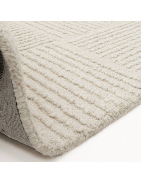 Elevate your home with the Zennith Grid, a modern designer rug featuring elegant geometric texture and durable, soft natural wo