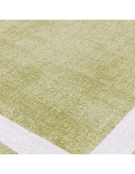 Tappeto minimal in lana naturale verde salvia con motivo a cornice, elegante e versatile, perfetto per ambienti moderni e raffi
