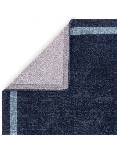 Tappeto minimal Albi Navy in lana naturale blu tinta unita, elegante e versatile, perfetto per ambienti moderni e confortevoli.
