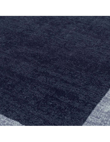 Elevate your space with the Albi Navy rug, a minimalist rug crafted from natural wool featuring a sleek geometric border and du