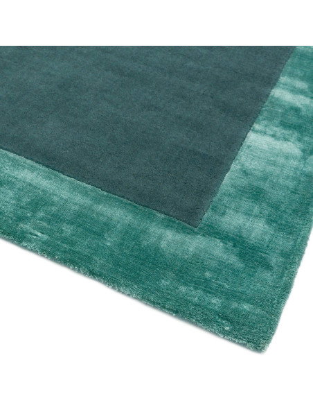 Elevate your space with the Ascot Aqua Blue rug, a minimalist rug blending natural fibres and elegant geometric design for time