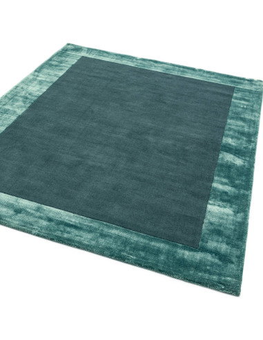 Elevate your space with the Ascot Aqua Blue rug, a minimalist rug blending natural fibres and elegant geometric design for time