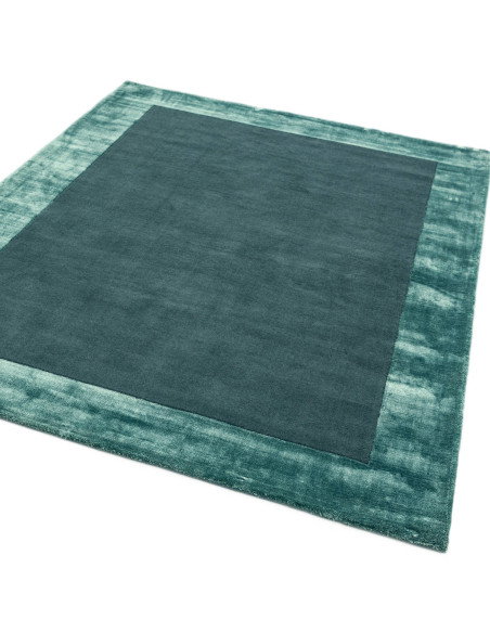 Elevate your space with the Ascot Aqua Blue rug, a minimalist rug blending natural fibres and elegant geometric design for time