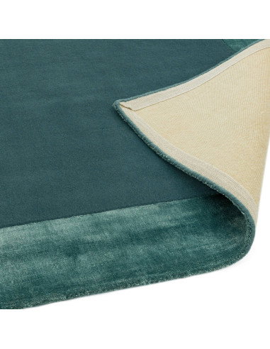 Elevate your space with the Ascot Aqua Blue rug, a minimalist rug blending natural fibres and elegant geometric design for time