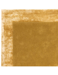 Elevate your space with the Ascot Gold rug, a handcrafted minimalist rug featuring a warm geometric border and luxurious natura 2