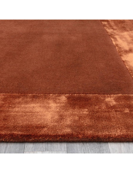 Elevate your space with the Ascot Rust rug, featuring a timeless geometric design in warm tones—perfect for minimalist rugs and