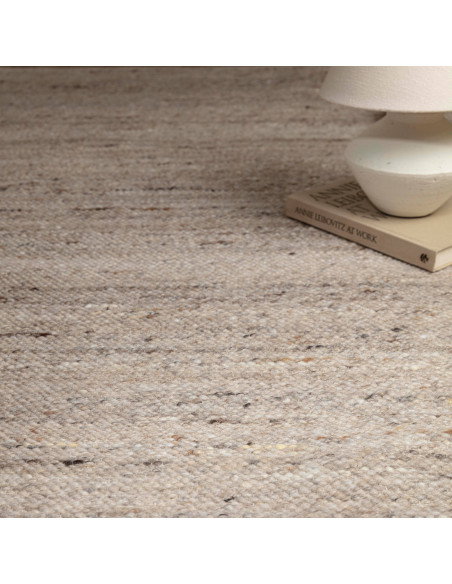 Handcrafted Birkdale Beige rug blends natural fibers and minimalist design, adding warmth and subtle texture to any modern or c