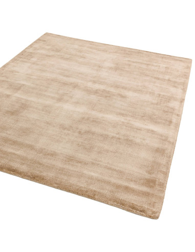 Elevate your space with the Blade Champagne rug, a minimalist rug in a neutral tone offering soft texture and effortless style