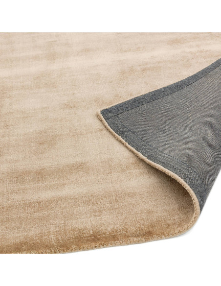 Elevate your space with the Blade Champagne rug, a minimalist rug in a neutral tone offering soft texture and effortless style