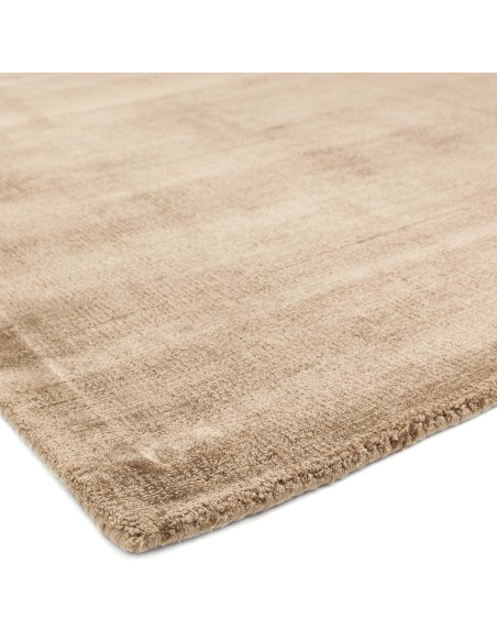 Elevate your space with the Blade Champagne rug, a minimalist rug in a neutral tone offering soft texture and effortless style