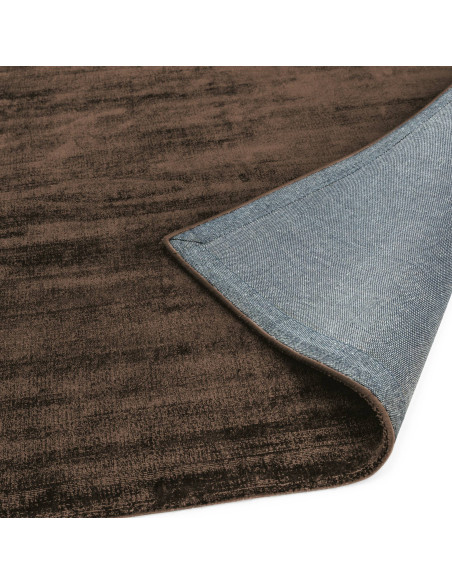 Elevate your space with the Blade Chocolate rug, a handcrafted minimalist rug featuring a soft viscose texture and timeless neu