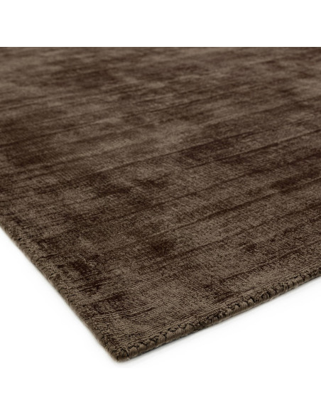 Elevate your space with the Blade Chocolate rug, a handcrafted minimalist rug featuring a soft viscose texture and timeless neu