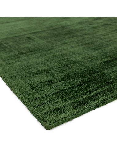 Elevate your space with the Blade Green minimalist rug, featuring soft viscose fibers and a calming natural tone for effortless
