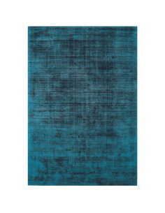 Tappeto tinta unita Blade Teal in viscosa naturale, design minimal e comfort artigianale per un ambiente elegante e moderno.