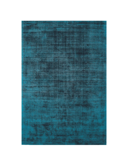 Elevate your space with the Blade Teal minimalist rug, featuring soft natural viscose and a sleek, elegant plain color design f