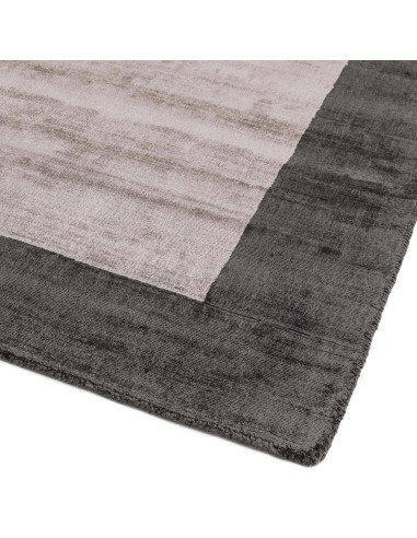Elevate your space with the Blade Border Charcoal/Silver rug, a handcrafted minimalist rug featuring a sleek geometric design a
