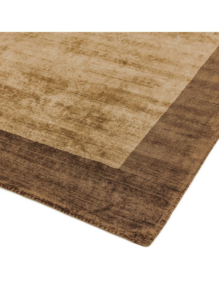 Elevate your space with the Blade Border Choco/Mocha rug, a handcrafted minimalist rug featuring elegant neutral tones and dura