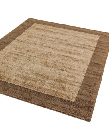 Elevate your space with the Blade Border Choco/Mocha rug, a handcrafted minimalist rug featuring elegant neutral tones and dura