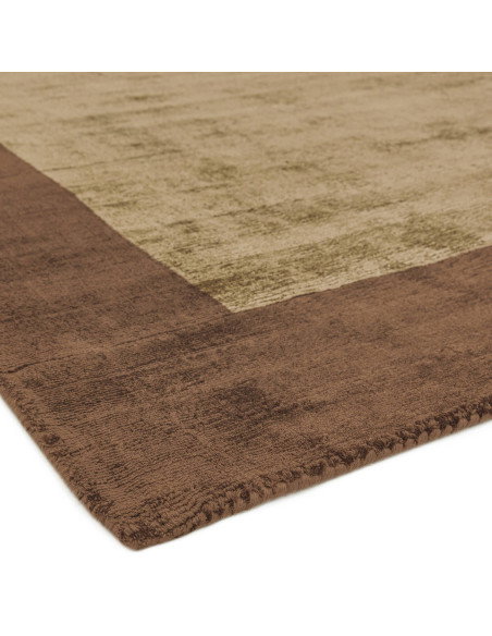 Elevate your space with the Blade Border Choco/Mocha rug, a handcrafted minimalist rug featuring elegant neutral tones and dura