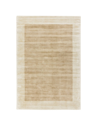 Elevate your space with the Blade Border Putty/Champagne rug, a handmade minimalist rug featuring a neutral palette and elegant