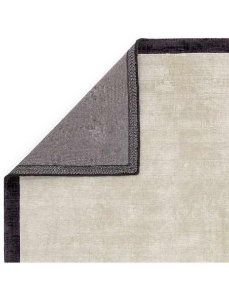Elevate your space with the Blade Border Putty/Charcoal 10 rug, a hand-crafted minimalist rug featuring a sleek geometric desig