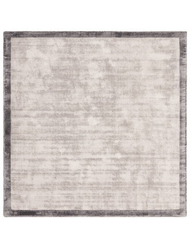 Elevate your space with the Blade Border Silver/Grey 08, a handcrafted minimalist rug featuring a subtle geometric border in el
