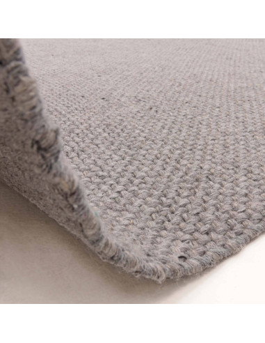 Handcrafted Finley Grey rug offers minimalist elegance with a soft neutral tone, plush comfort, and durable fibers—perfect for
