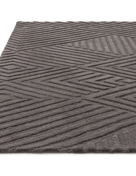 Elevate your space with the Hague Charcoal rug—hand-tufted minimalist rug in neutral tones, offering soft wool comfort and time