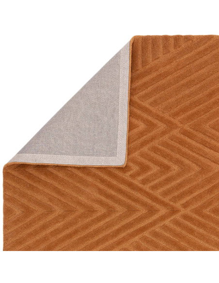 Elevate your space with the Hague Desert rug, a natural wool minimalist rug featuring geometric design and warm terracotta tone