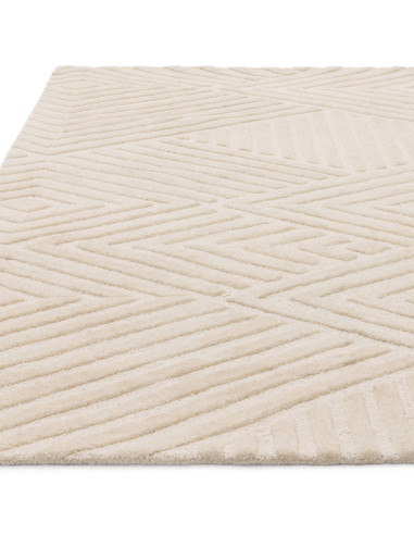 Elevate your space with the Hague Ivory rug, a durable, handmade minimalist rug featuring a timeless neutral design and plush n