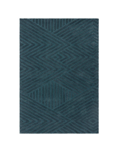 Elevate your space with the Hague Teal Rug, a minimalist rug crafted from natural wool featuring an elegant geometric design an