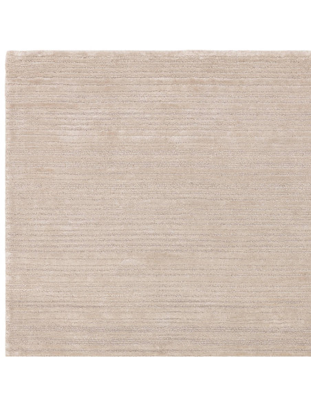 Elevate your space with the Henley Putty rug, a handcrafted minimalist rug in a timeless neutral shade for cozy, elegant living