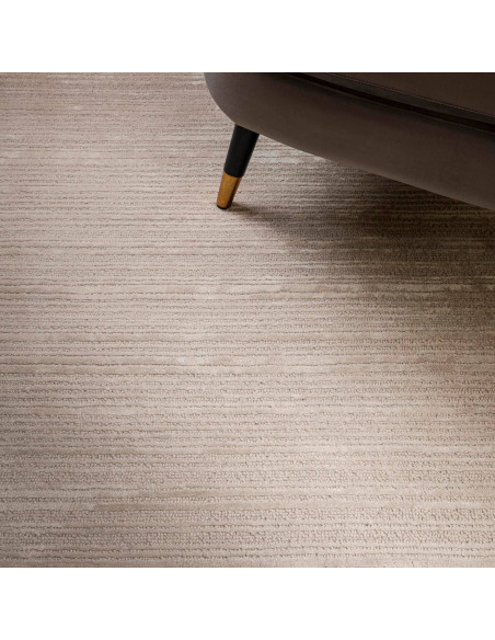 Elevate your space with the Henley Putty rug, a handcrafted minimalist rug in a timeless neutral shade for cozy, elegant living