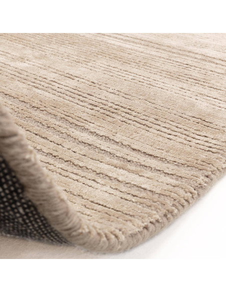 Tappeto Henley Sand: eleganza minimalista tinta unita, morbido e resistente, perfetto per valorizzare ogni ambiente con stile e